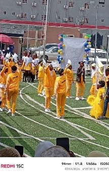 Yellow house squad parading on the track