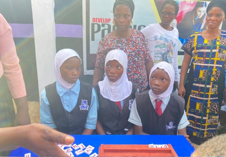 Students engaged in class at Real Light Schools